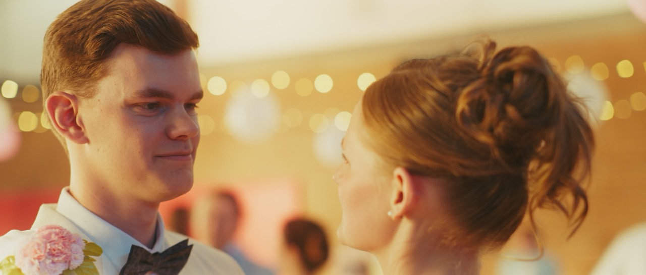 a man and a woman dance together
