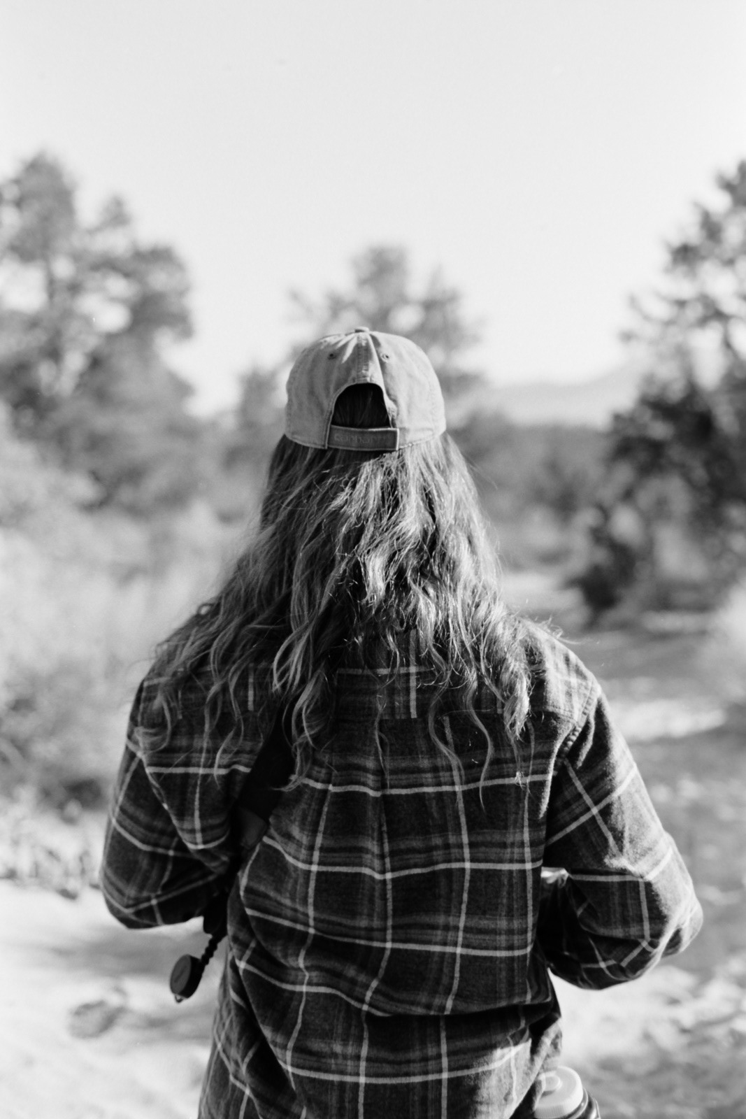 black and white portrait of a girl walking into the unknown