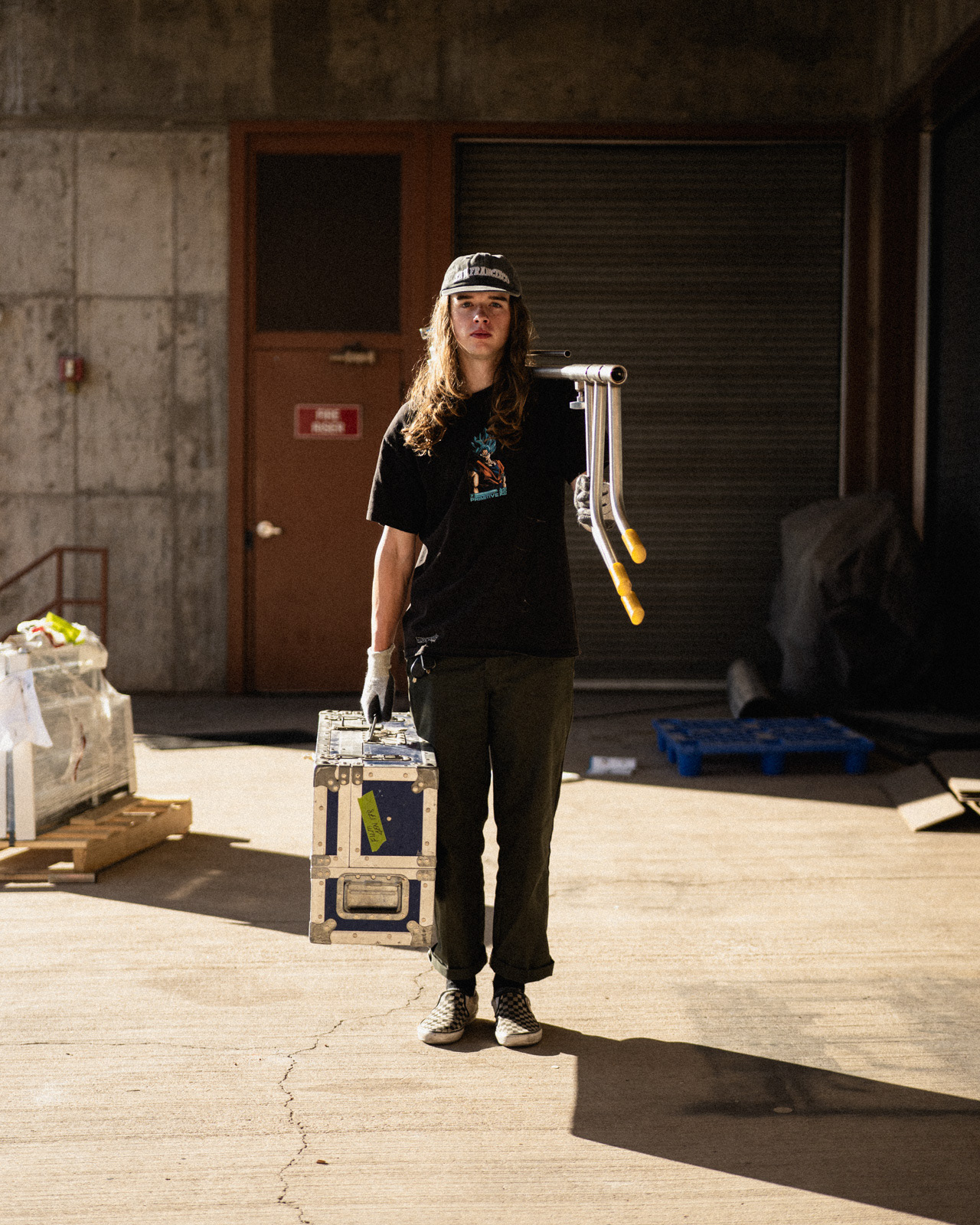 industrial space with a man holding equipment