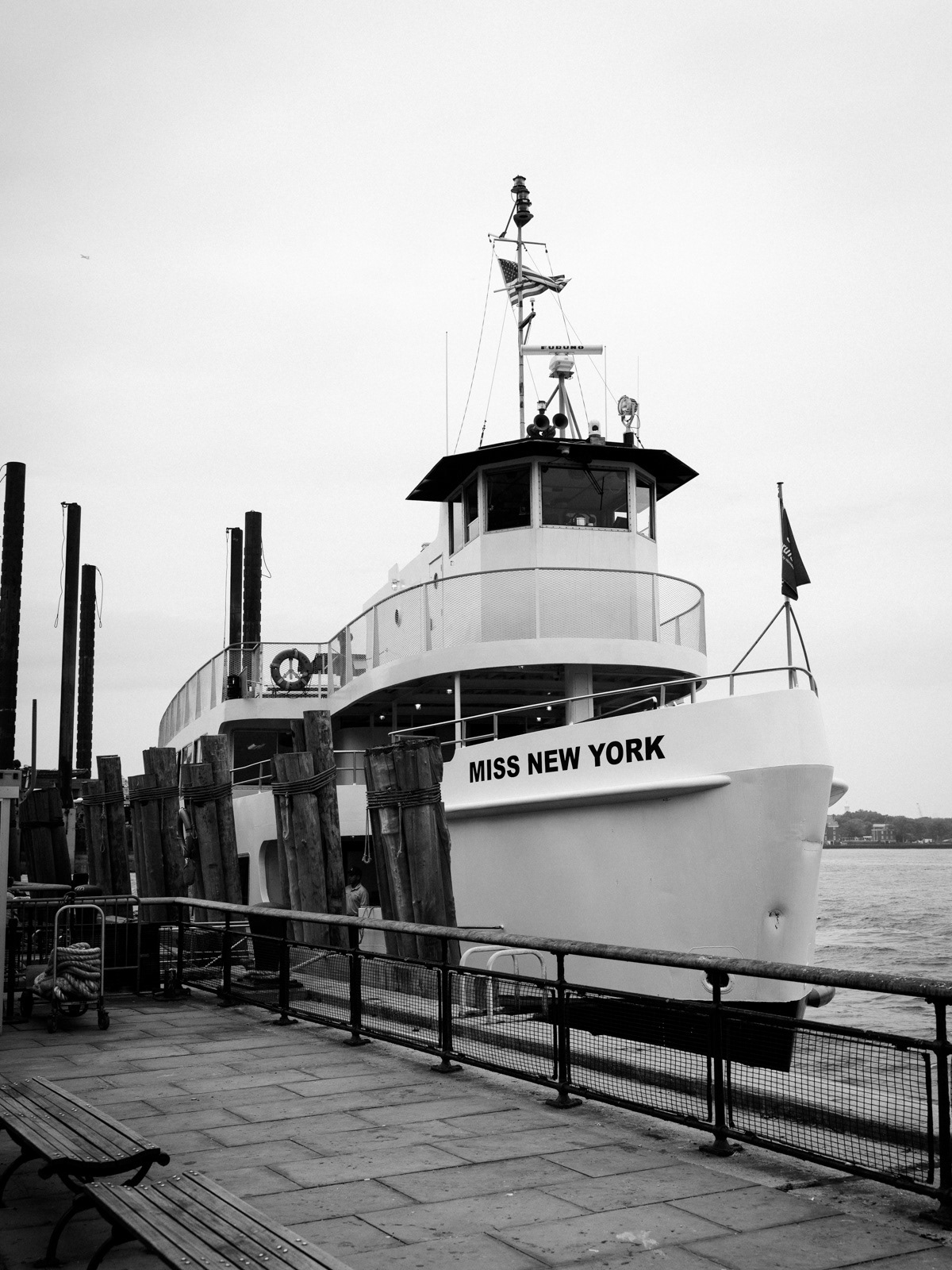 black and white photo of a boat in New York City